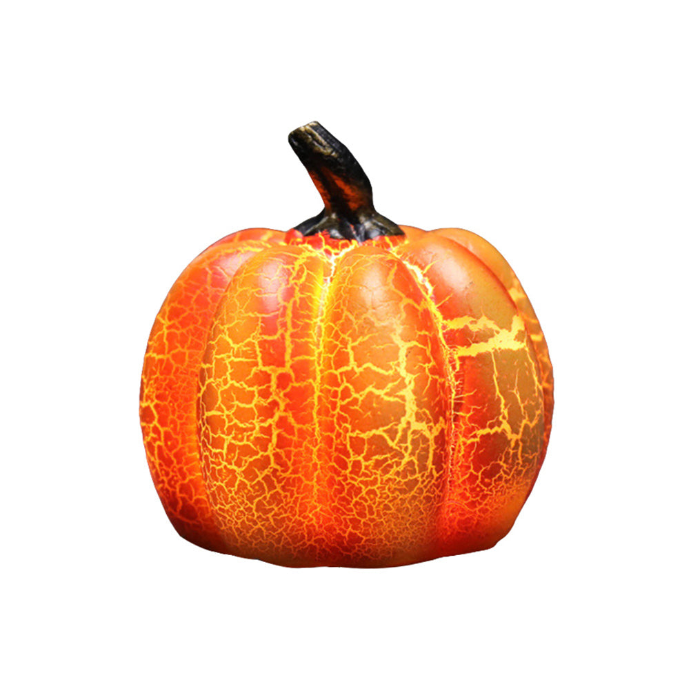Carved pumpkin lantern detail showing moulded resin face