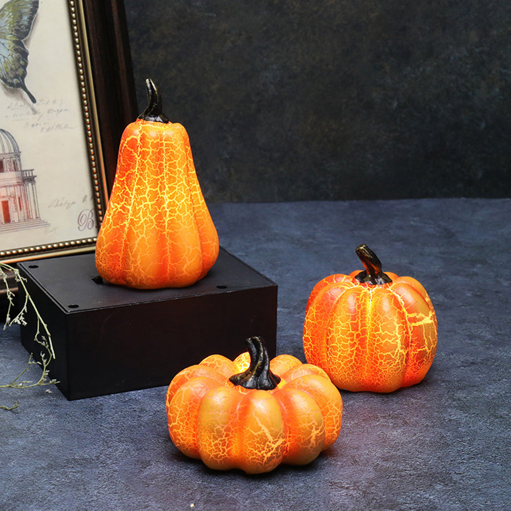 Flameless LED pumpkin lantern on a table at night